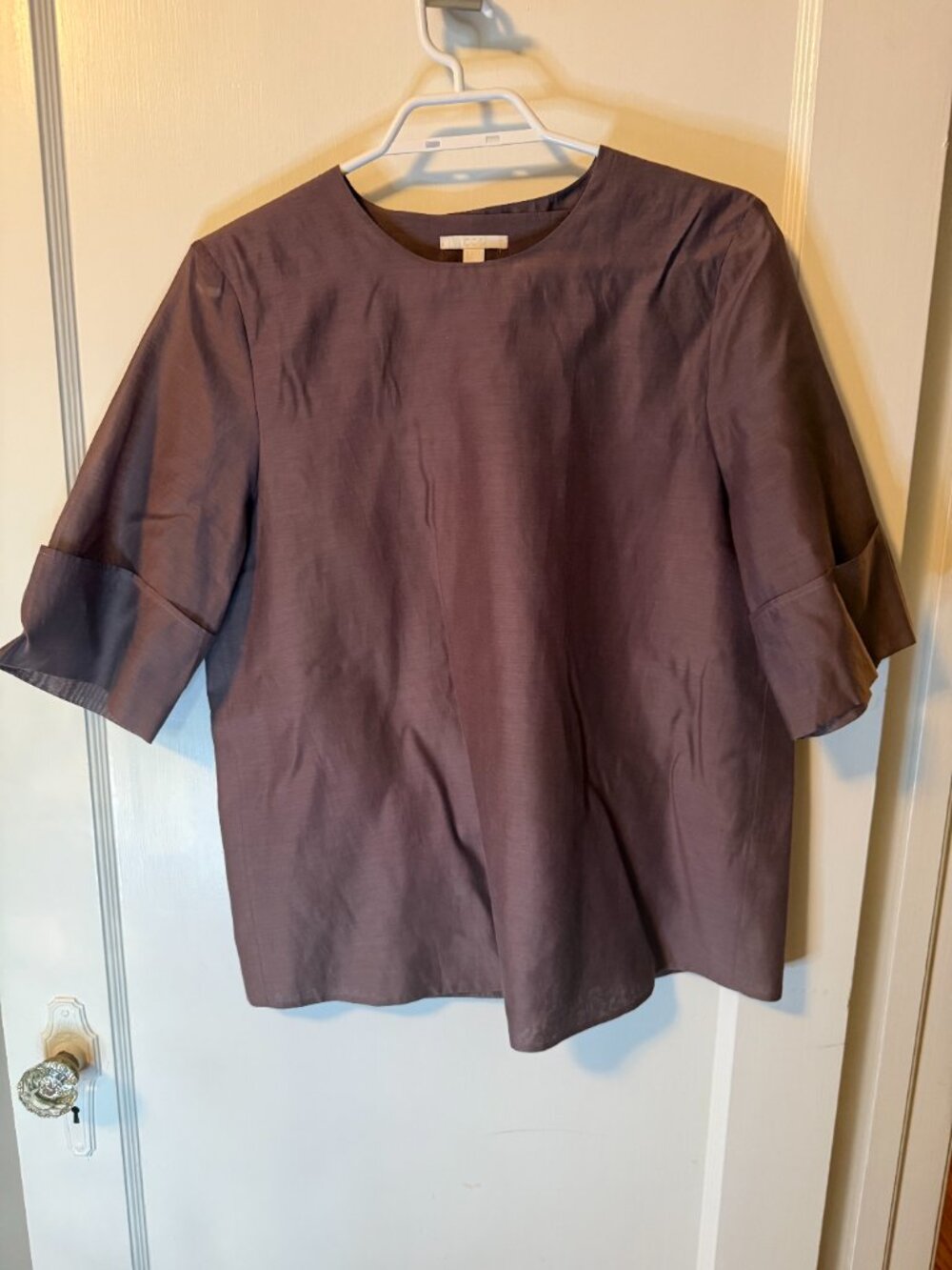 COS poplin light plum asymmetrical short-sleeve top.